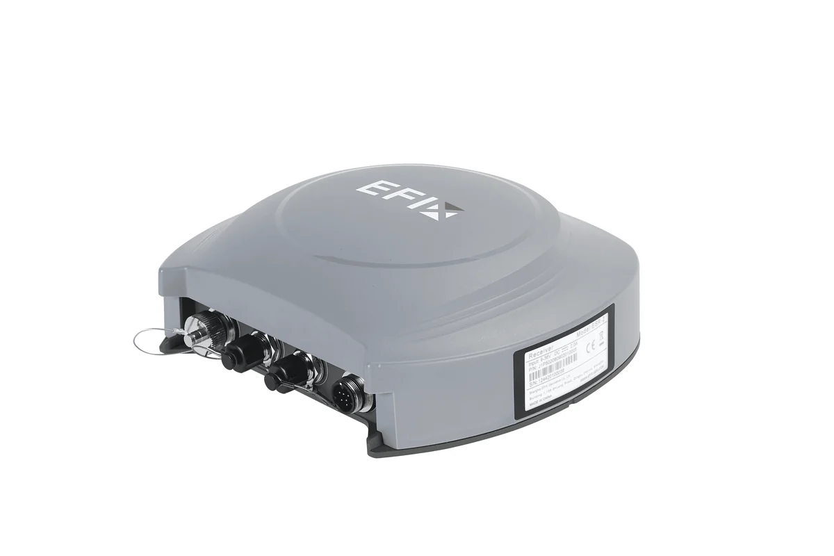 El receptor GNSS d'EFIX, gris, amb els connectors al lateral
